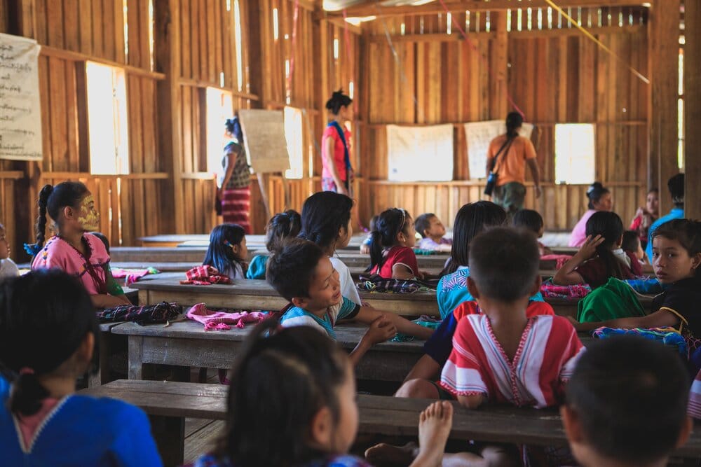 Source: Capturing the human heart., Group of toddlers on the school with teacher teaching, Unsplash