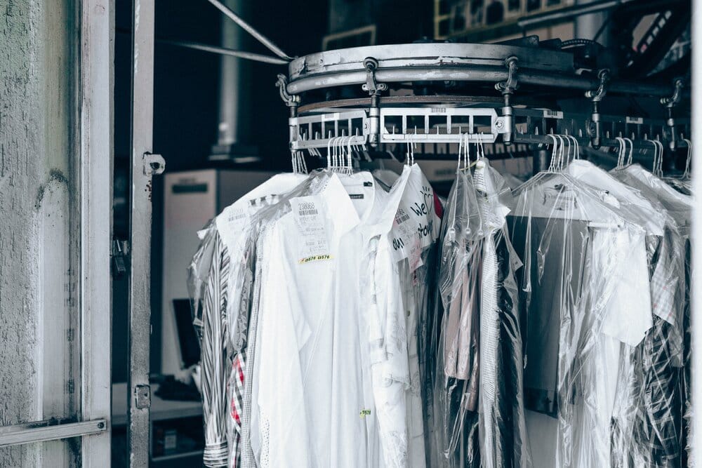 Source: Nathan Dumlao, Close-up photo of top hanged on rack, Unsplash